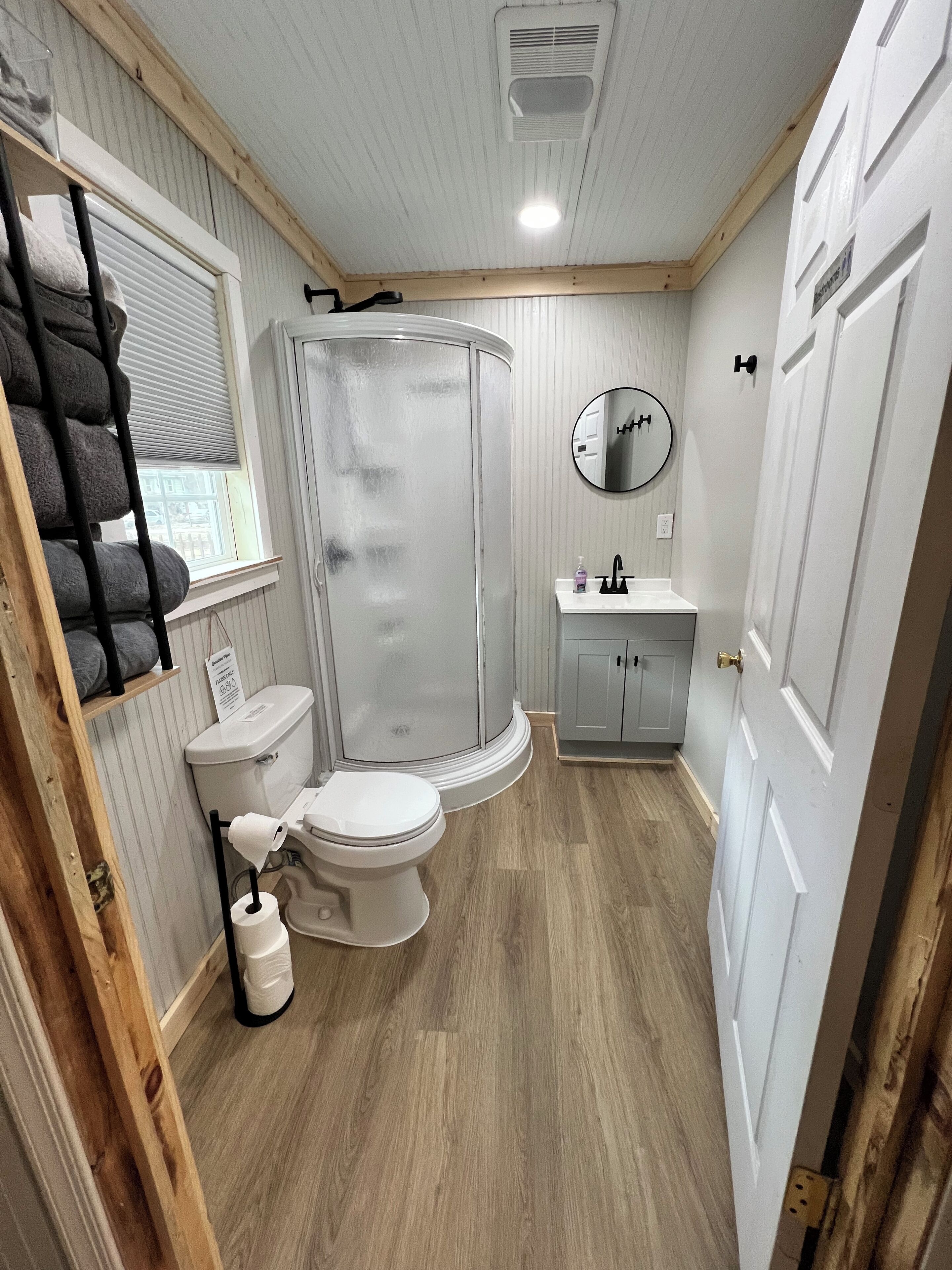 Shower, towels, soap, toilet paper