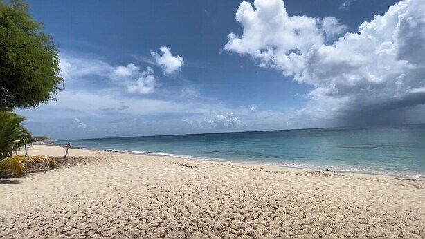 A beach with clear skies and calm waters. - Island Oasis, Near Magens Bay Beach with Back-Up Power System (Charlotte Amalie)