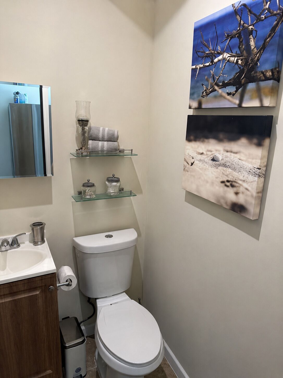 A bright and welcoming half bath for added comfort during your island getaway.