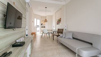 Luxury Apartment | Living area | 40-inch Smart TV with digital channels