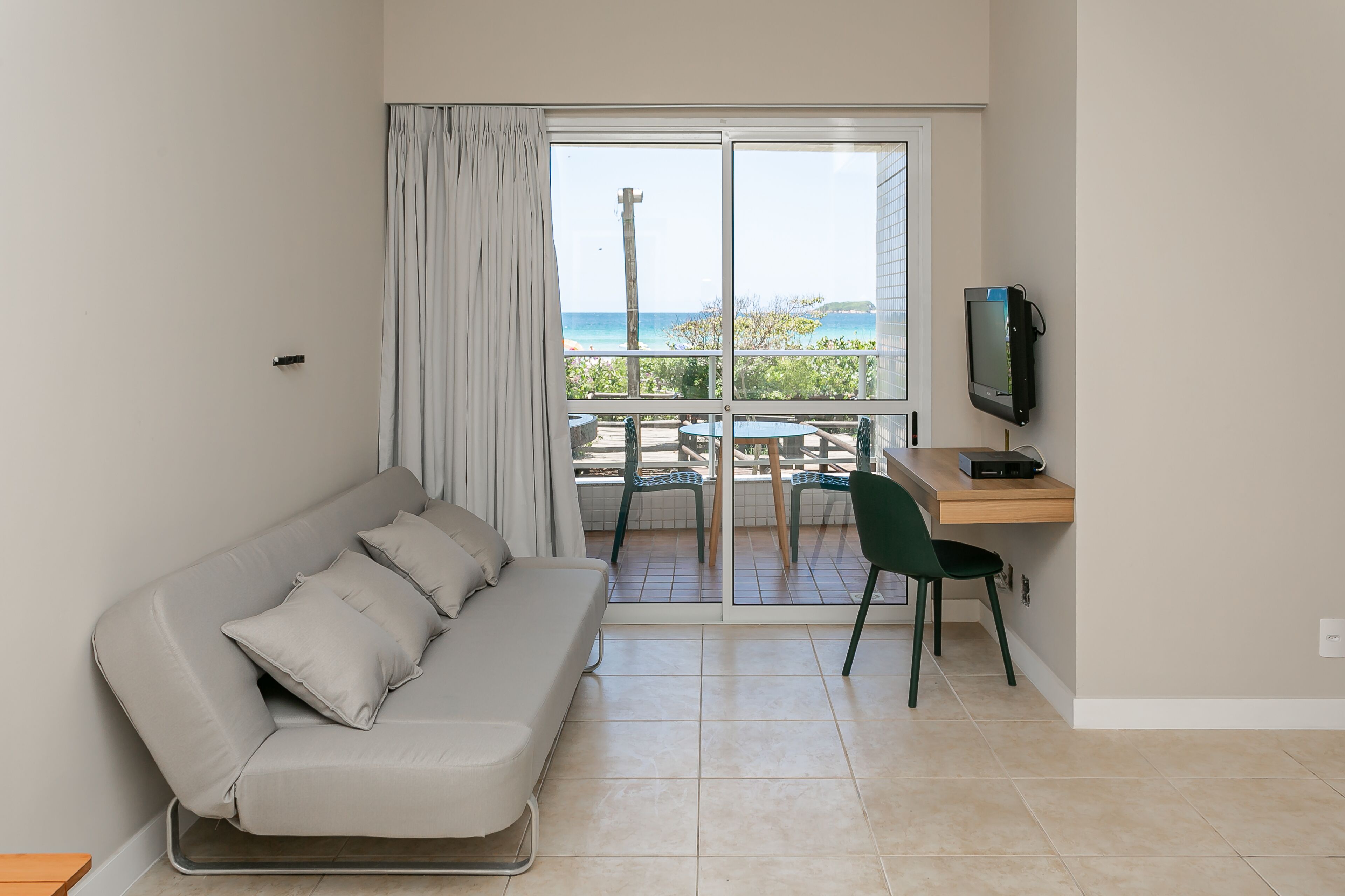 Comfort Apartment | Living area | 40-inch Smart TV with digital channels