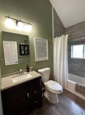 Hair dryer, towels, soap, shampoo