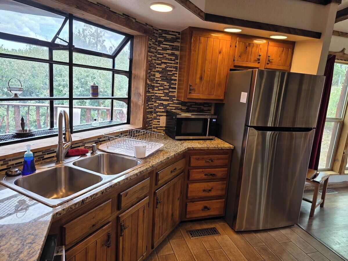 Stainless appliances and everything you need to cook.
