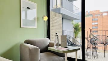 Departamento exclusivo | Área de sala de estar | Smart TV de 40 pulgadas con canales por cable