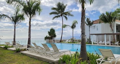 bohemian chic atmosphere with beach access and private swimming pool.