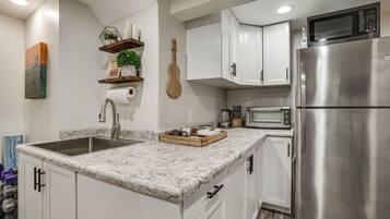 Fridge, microwave, toaster, cookware/dishes/utensils
