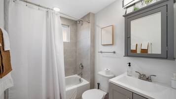 Family Apartment | Bathroom | Free toiletries, hair dryer, towels, soap