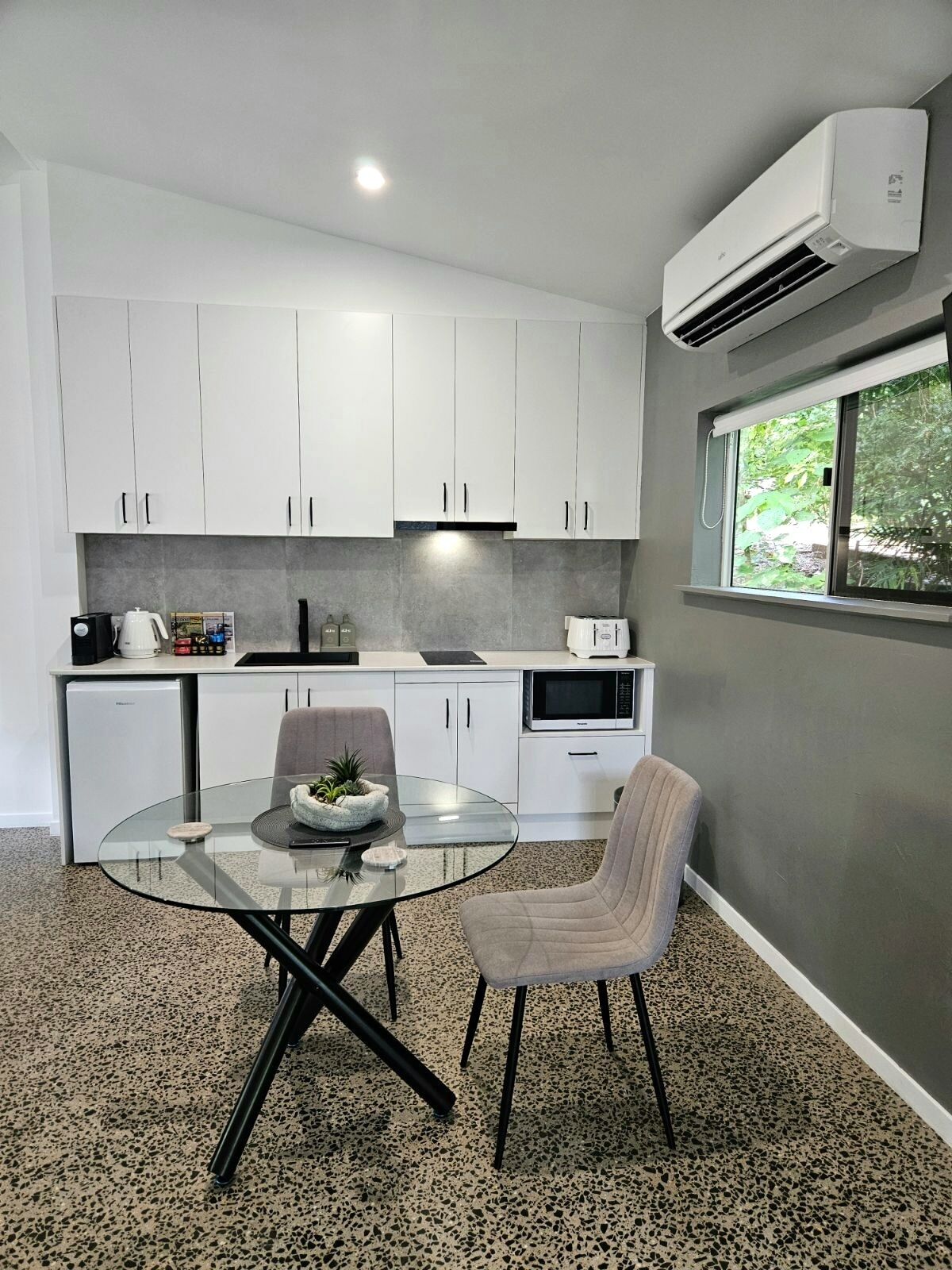 Fridge, microwave, stovetop, coffee/tea maker