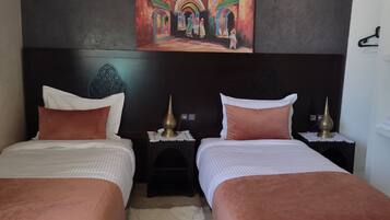 Basic Twin Room | Premium bedding, memory foam beds, individually decorated