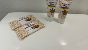 Three Nature's Bliss shea butter collection products on a white surface. - Budget Inn Hollywood (Los Angeles)