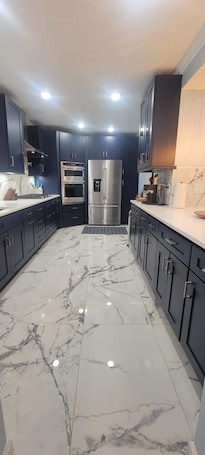 Fridge, microwave, oven, stovetop. Huge Family House 12 miles from NYC/4Bath/Parking