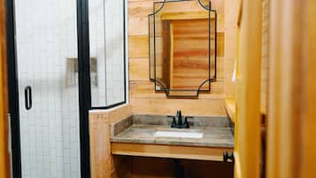 Shower, towels, soap, toilet paper