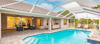 Delightful home near beaches with heated pool, patio, lanai, grill, & streaming