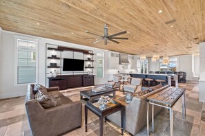 Una televisión, libros, una biblioteca de música, una videoteca