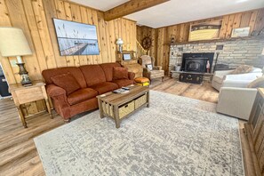 TV, books - Incredible lakefront house with cottages, dock, fire pit, decks, & amazing views (Topinabee)