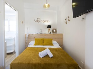 1 habitación, tabla de planchar con plancha, internet y ropa de cama 