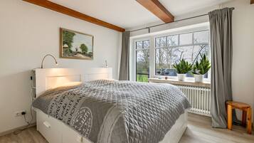 2 dormitorios, tabla de planchar con plancha, wifi gratis y ropa de cama