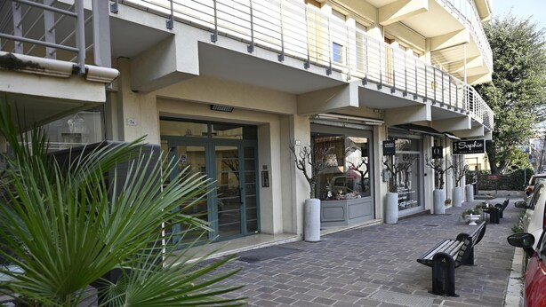 A building with a ground-floor boutique store named 'Sophie' and a second-floor residential unit. - Purpo in Cattolica With 1 Bedrooms and 1 Bathrooms (Cattolica)