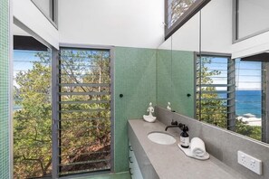 Shower, hair dryer, towels, shampoo - Award-Winning Glass Home | Forresters, Sleeps 8 (Forresters Beach)
