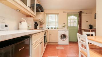 Fridge, electric kettle, toaster, cookware/dishes/utensils