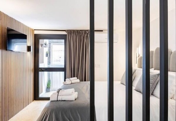 1 habitación, tabla de planchar con plancha, wifi y ropa de cama 
