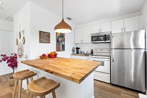 Microwave, oven, coffee/tea maker, cookware/dishes/utensils