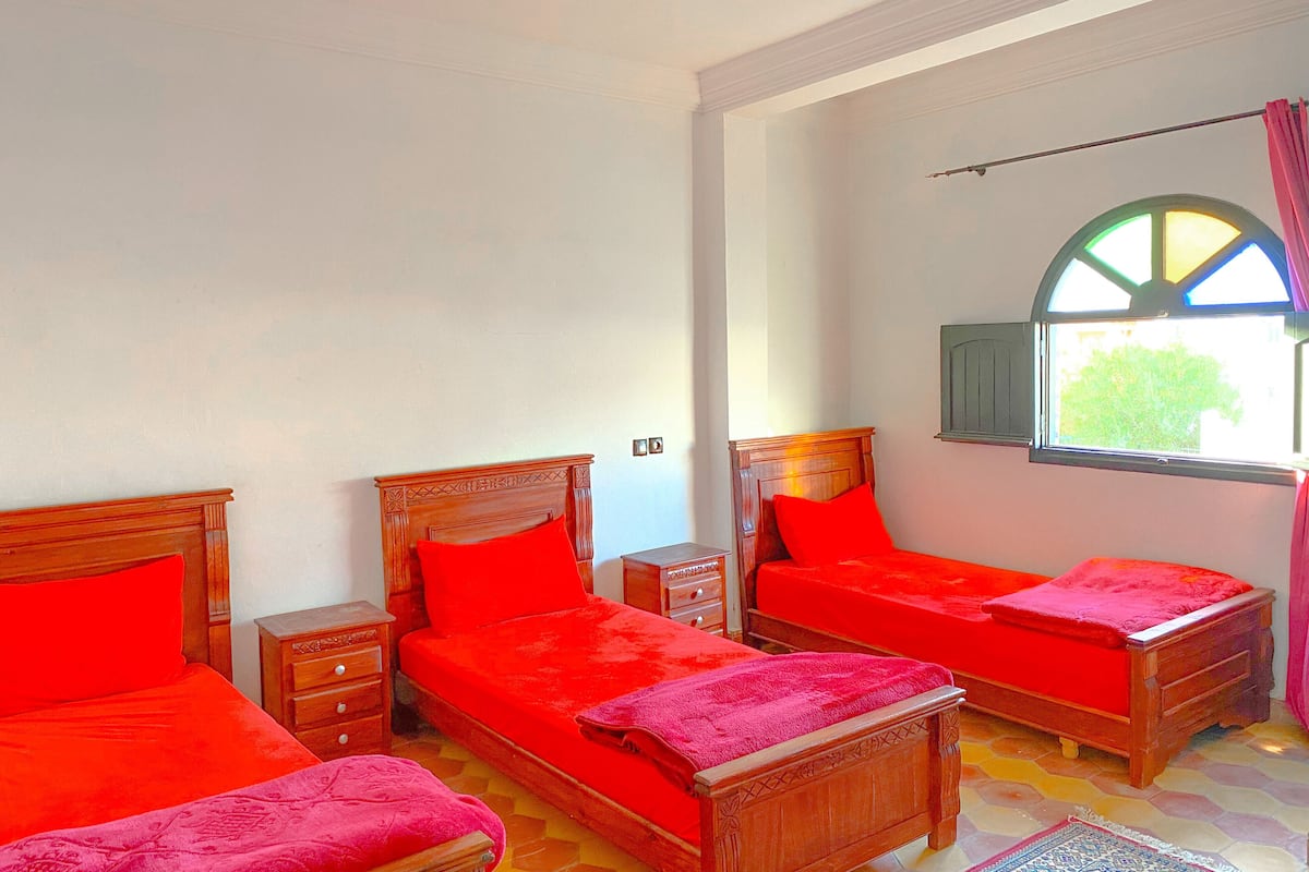 Standard Quadruple Room | Desk, blackout drapes, free WiFi, bed sheets