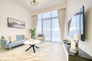 TV - Sizeable 1BR at Azizi Riviera 35, Al Merkadh by Deluxe Holiday Homes (Dubai)