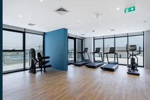 Work out in style with a view at our fitness center, featuring treadmills and a stationary bike.