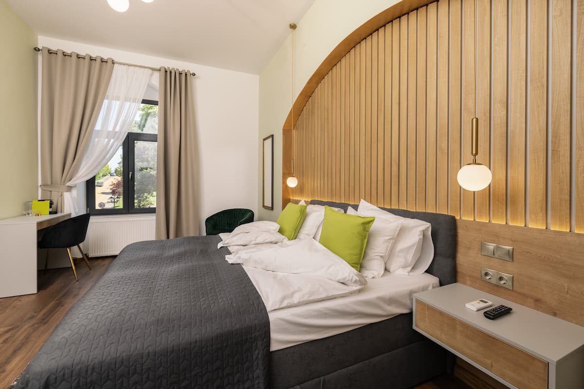 Chambre Deluxe | 1 chambre, literie de qualité supérieure, décoration personnalisée