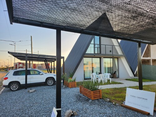 Cabañas alpinas en ambiente natural a metros de las piletas 