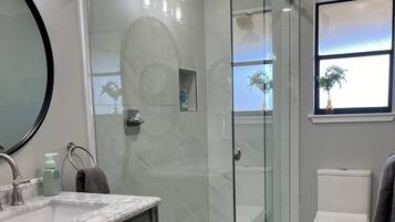 Shower, hair dryer, soap, shampoo