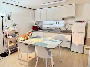 Fridge, microwave, electric kettle, cookware/dishes/utensils