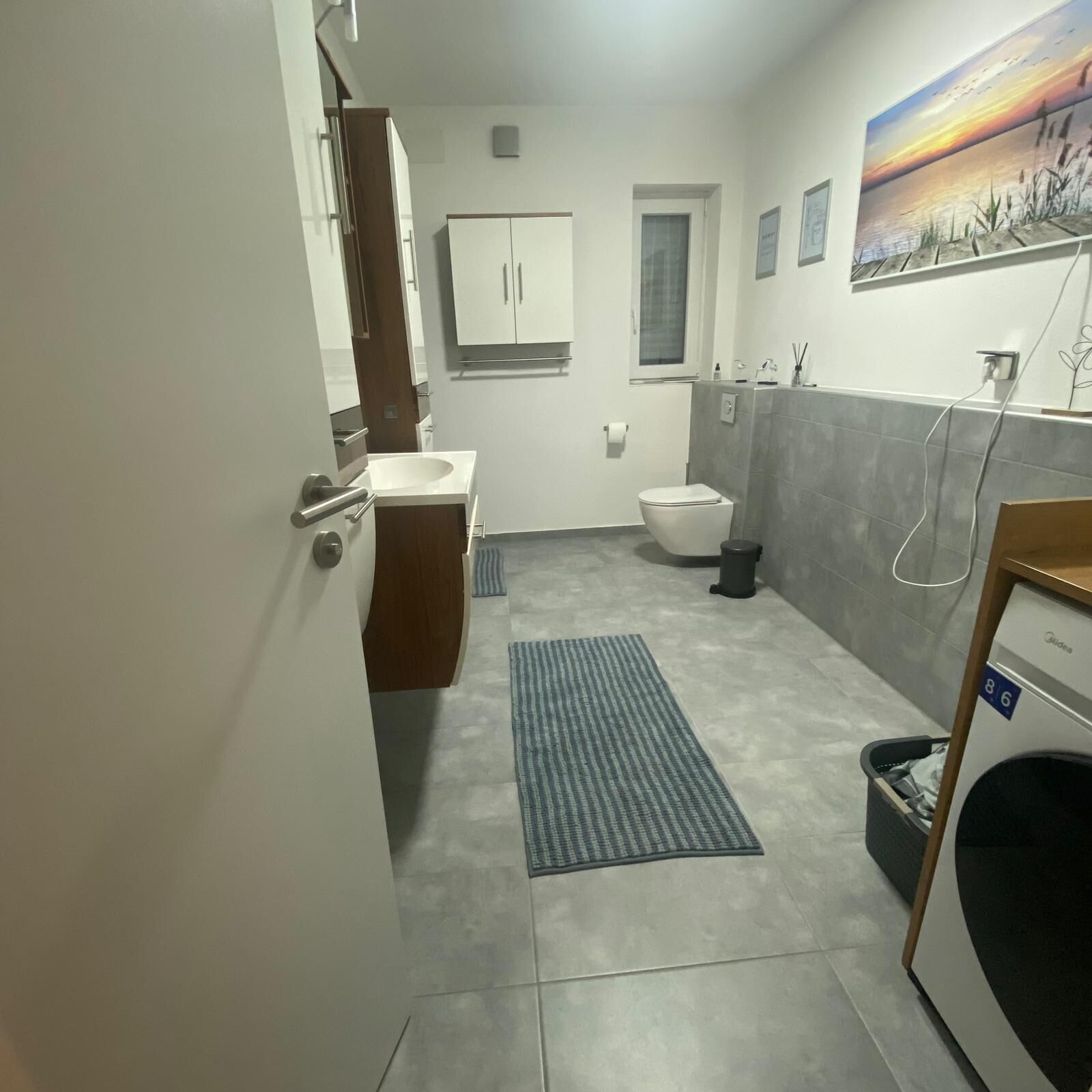 Douche, serviettes fournies, savon, shampoing