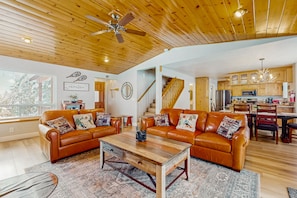 TV, fireplace, books - Cozy Tahoe Vista home with fireplace, furnished deck, & forest view (Tahoe Vista)