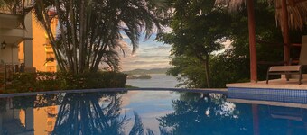 Amazing Ocean view Top Condo overlooking Playa Flamingo. Guarantee: best Sunsets