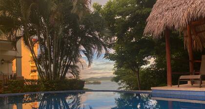 Amazing Ocean view Top Condo overlooking Playa Flamingo. Guarantee: best Sunsets