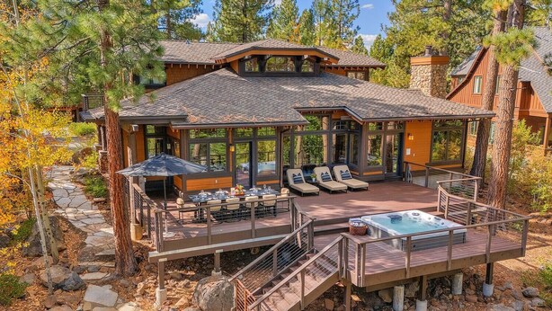 A cabin with a hot tub, outdoor seating, and a stone pathway. - Zoe's North Star at Northstar - TLUXP (Northstar)