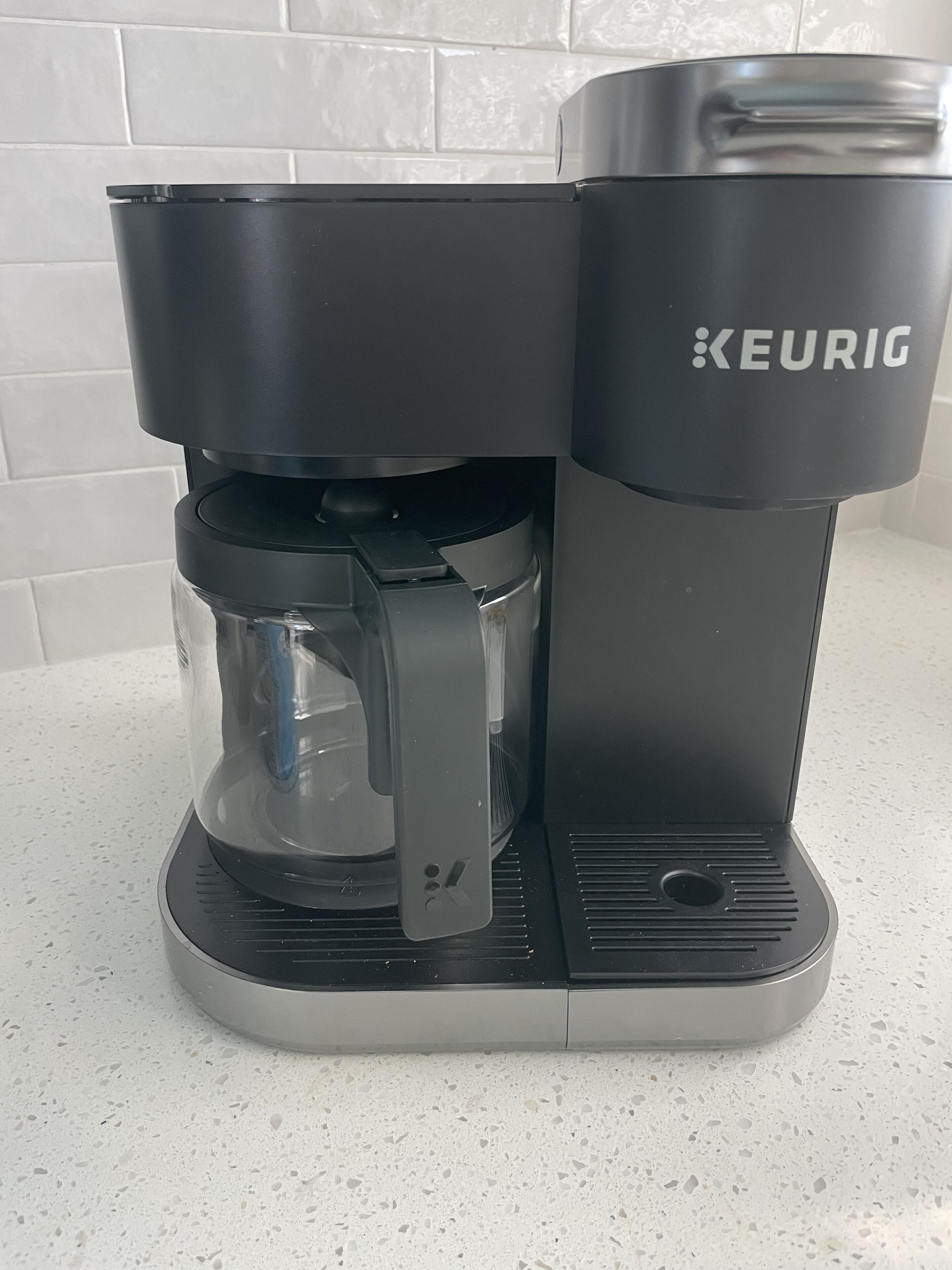 A Keurig coffee maker on a countertop.