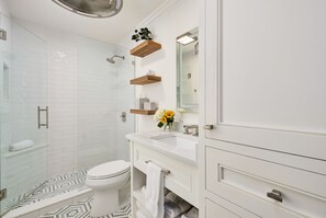 Shower, hair dryer, towels, soap