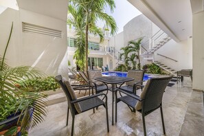 Outdoor dining - 1 BR Condo w/Pool. Heart of Downtown (Isla Mujeres)