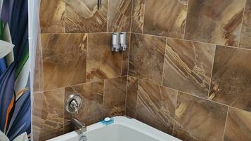 Shower, jetted bath, hair dryer, towels