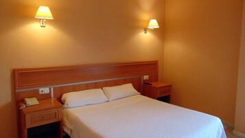 In-room safe, desk, laptop workspace, blackout curtains