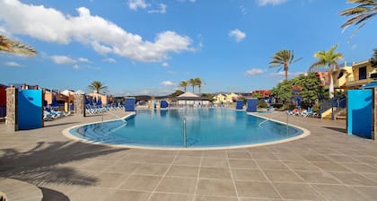 Vacation Apartment 'Meloneras 1' with Shared Pool, Wi-Fi and Air Conditioning