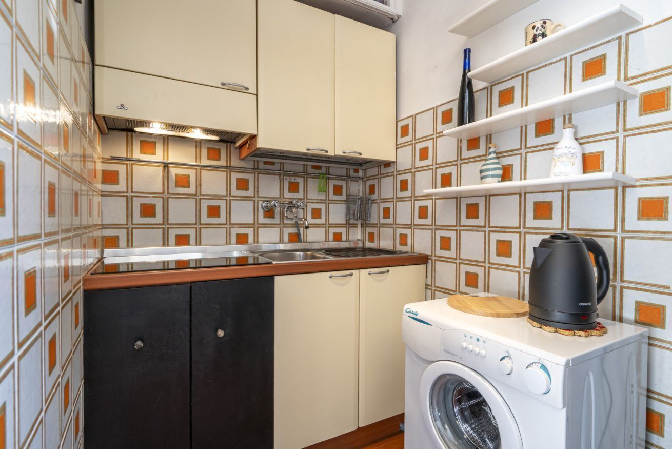 Fridge, microwave, stovetop, cookware/dishes/utensils