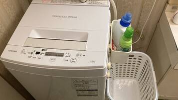 Separate bathtub and shower, deep-soaking bathtub, hair dryer, towels
