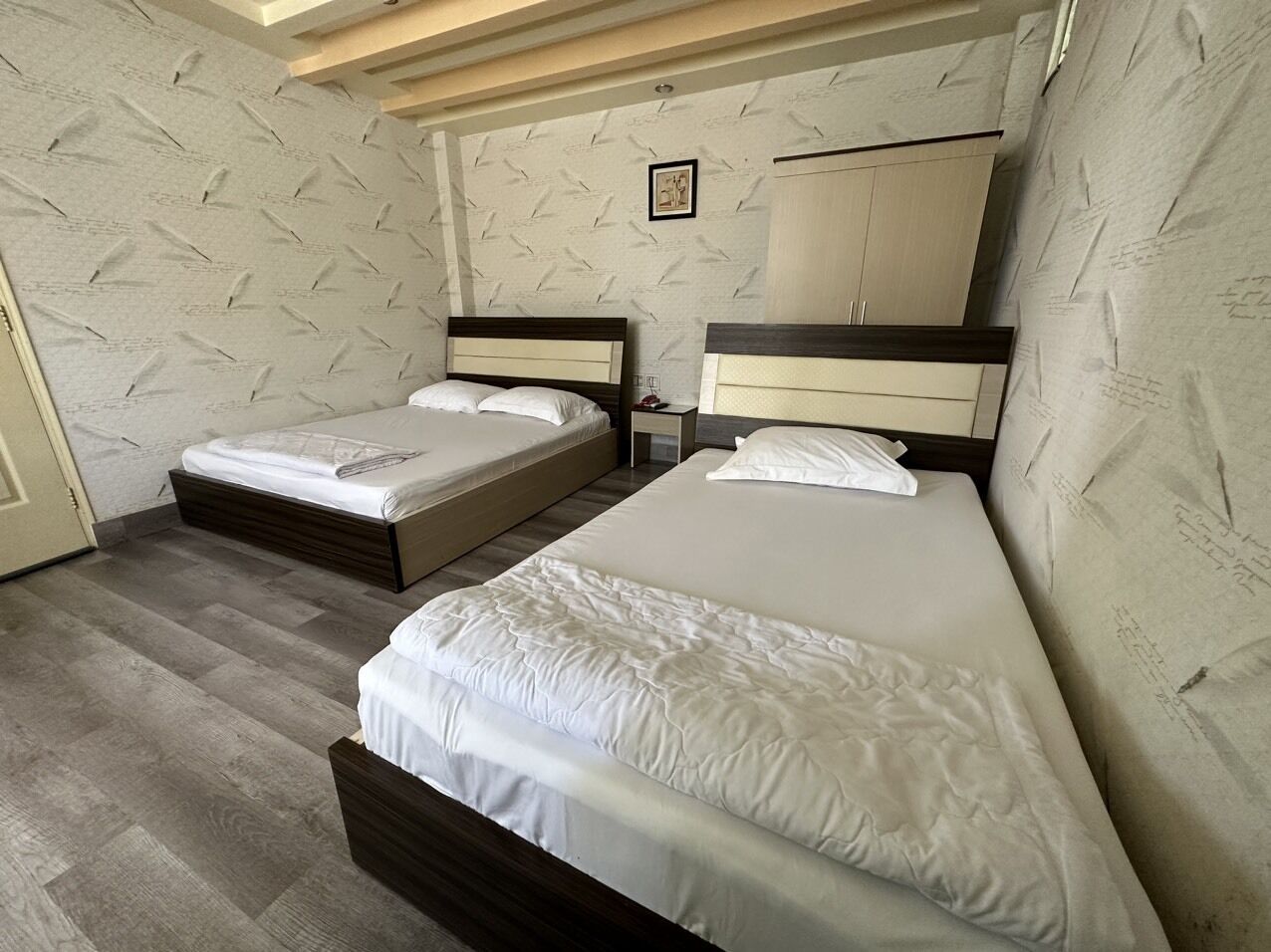 Basic Triple Room, Multiple Beds | Laptop workspace, free WiFi, bed sheets