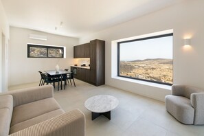 TV, fireplace - Stunning High-End Beauty with Bird’s Eye Vistas (Kostos)