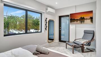 1 bedroom, desk, iron/ironing board, travel crib