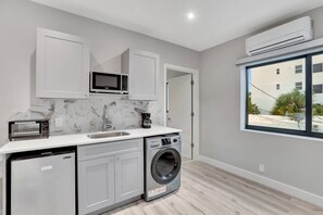 Fridge, microwave, coffee/tea maker, toaster
